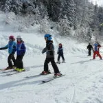 Groep skiërs - Véronick Le Palabe
